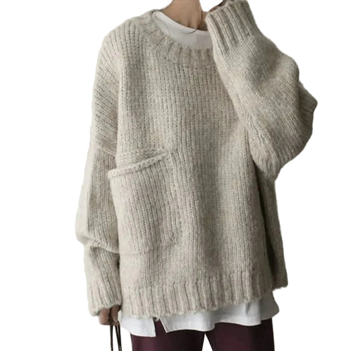 Oversize damtröja i mjukt tyg med praktisk framficka, perfekt för avslappnad look.