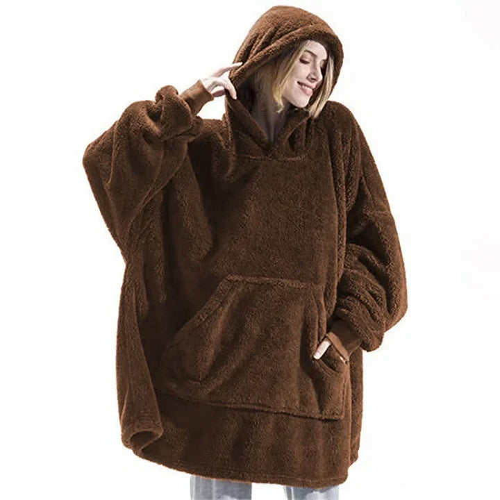 Upplev ultimat avslappning med denna oversized filttröja i mjuk fleece. Idealisk för damer & herrar som söker värme.