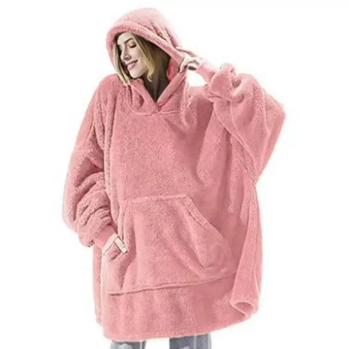 Mysig filttröja i oversized design för damer & herrar. Varm fleece ger avkoppling & komfort hemma under kalla dagar.