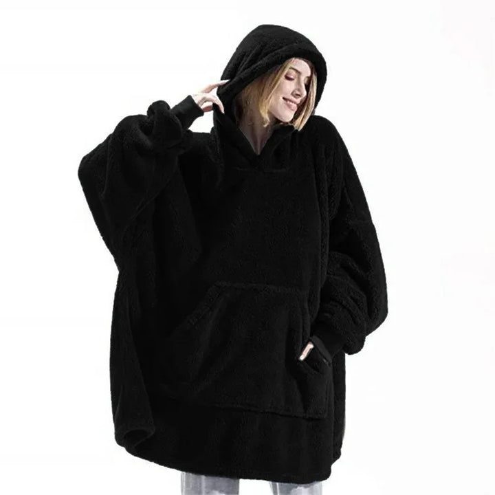 Bärbar filttröja oversized i fleece. Ger samma värme som en filt men med frihet för damer & herrar.