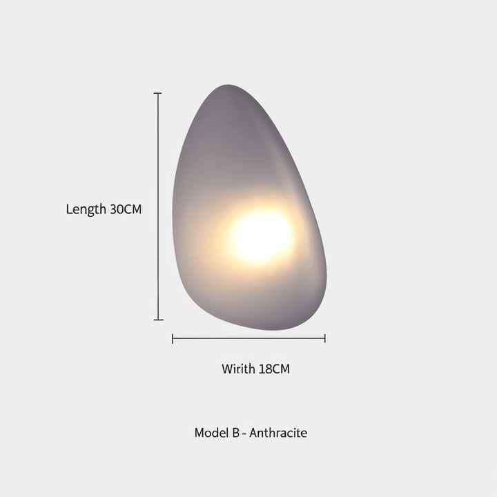 Stilren PebbleHue LED-vägglampa, vacker nordisk design för en mysig atmosfär.