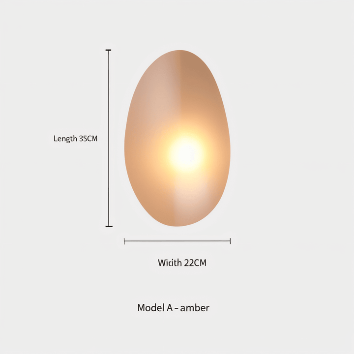 PebbleHue LED-vägglampa, skapar varm och mysig belysning med nordisk charm.