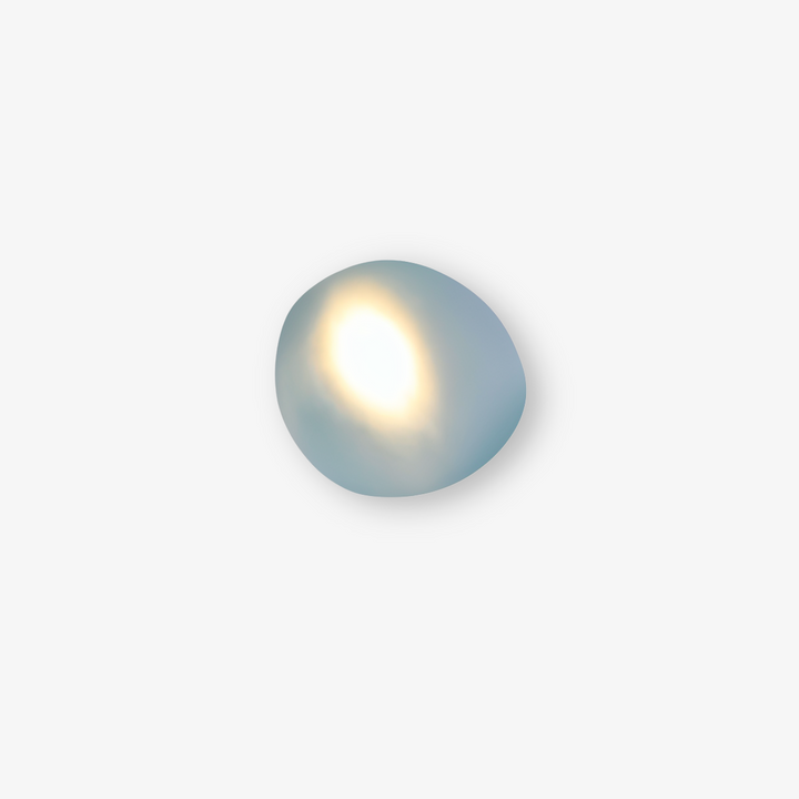 Modern PebbleHue LED-vägglampa, nordisk design som passar alla hemstilar.