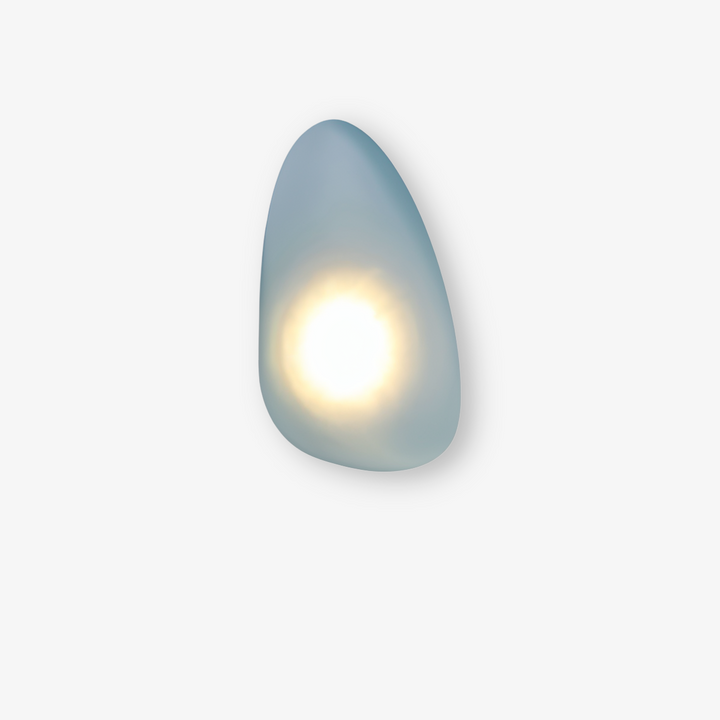 Modern nordisk design: PebbleHue LED-vägglampa för stilfull vardagsrumsinredning.