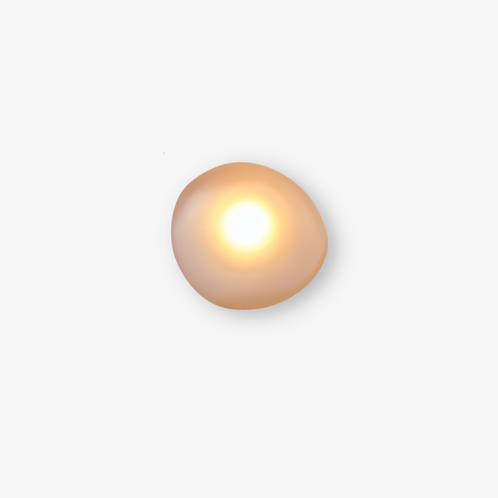 PebbleHue LED-vägglampa, en tidlös modern nordisk design för ett upplyst hem.