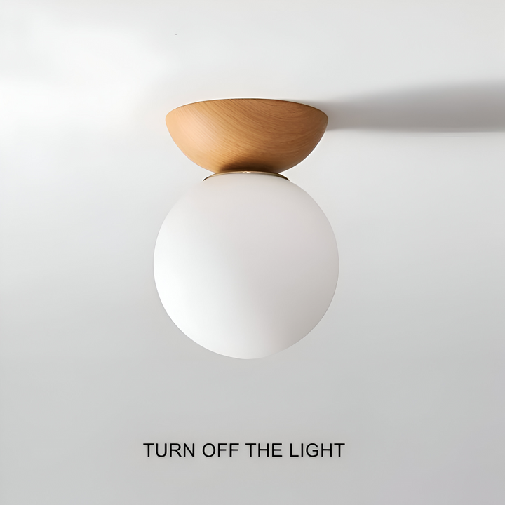 Perle LED-taklampa i full vy. Japansk, modern pendellampa med pärlor och valnötsträ.