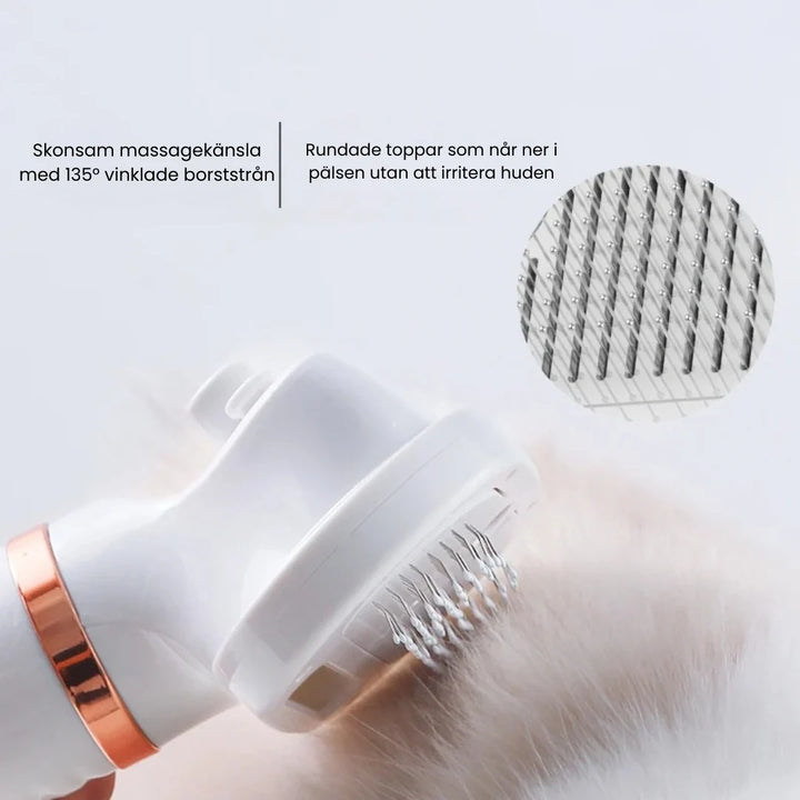 Detaljbild av Petdryer Pro 3-i-1 pälsfön borste med ergonomiskt handtag. Vit och grå design.