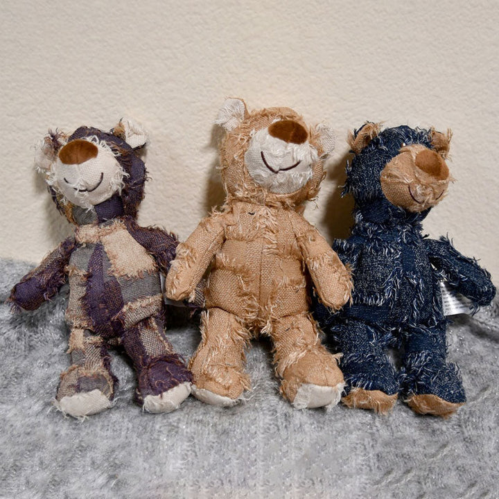 "Plyschbjörn tuggleksak för hundar, hållbar och mjuk. Blå och ljusbrun. Perfekt för aggressiva tuggare."