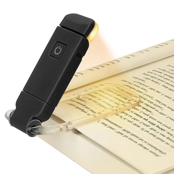 "Portabel justerbar uppladdningsbar LED-boklampa i rosa, svart, grön, blå eller vit med flexibel hållare och USB-laddning."