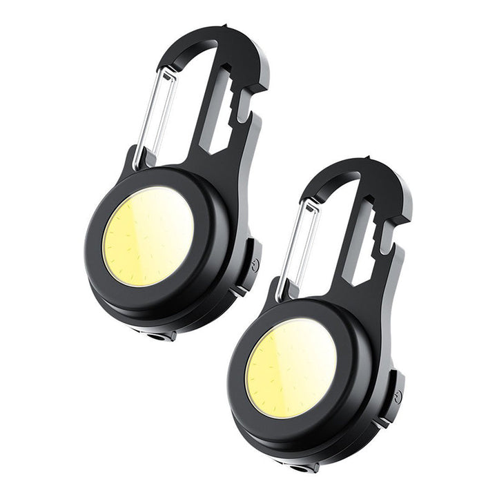"Portabel mini LED ficklampa, kompakt design, i aluminium med stark belysning, idealisk för utomhusäventyr."