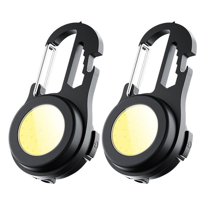 "Portabel mini LED ficklampa, kompakt design, i aluminium med stark belysning, idealisk för utomhusäventyr."