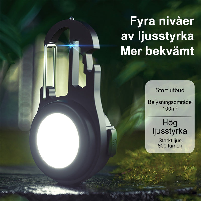 "Portabel mini LED ficklampa, kompakt design, i aluminium med stark belysning, idealisk för utomhusäventyr."