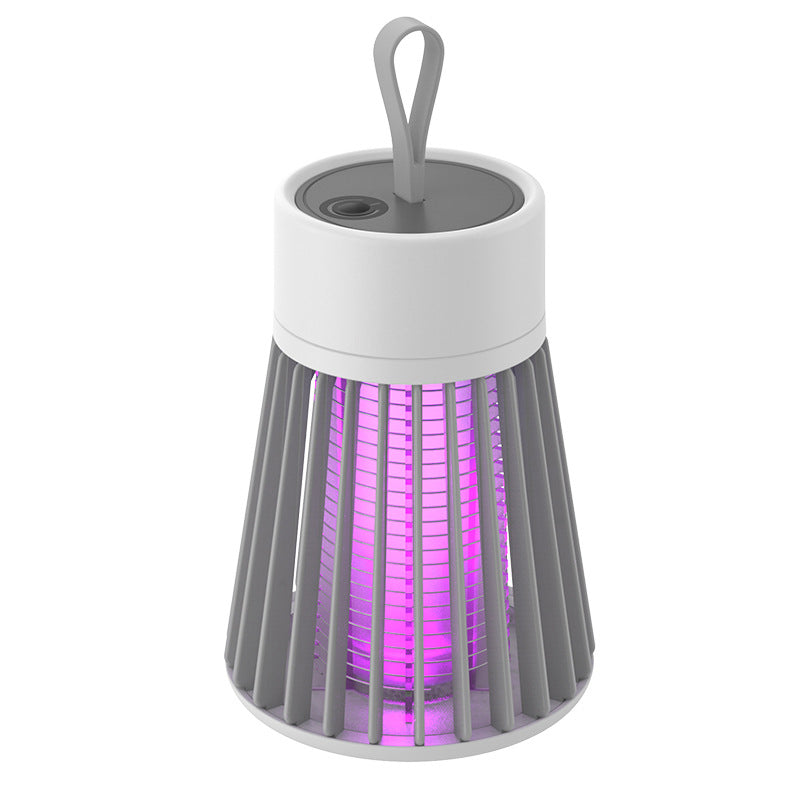 Portabel myggdödarlampa med USB-laddning, säker design, kompakta vita detaljer mot grå bakgrund, bekämpar insekter.