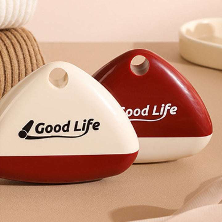 "Portabel tvättbar luddroller för hushållsbruk, vit+röd, elegant design, tar bort damm och djurhår enkelt."