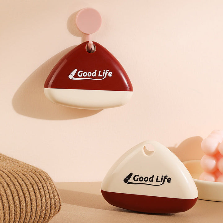 "Portabel tvättbar luddroller för hushållsbruk, vit+röd, elegant design, tar bort damm och djurhår enkelt."