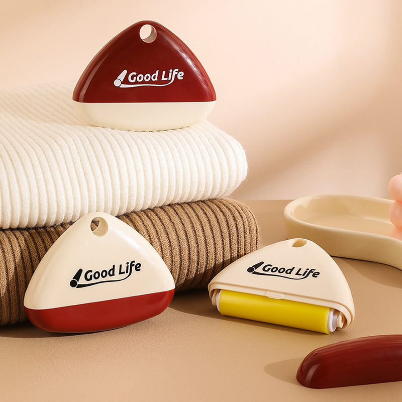 "Portabel tvättbar luddroller för hushållsbruk, vit+röd, elegant design, tar bort damm och djurhår enkelt."