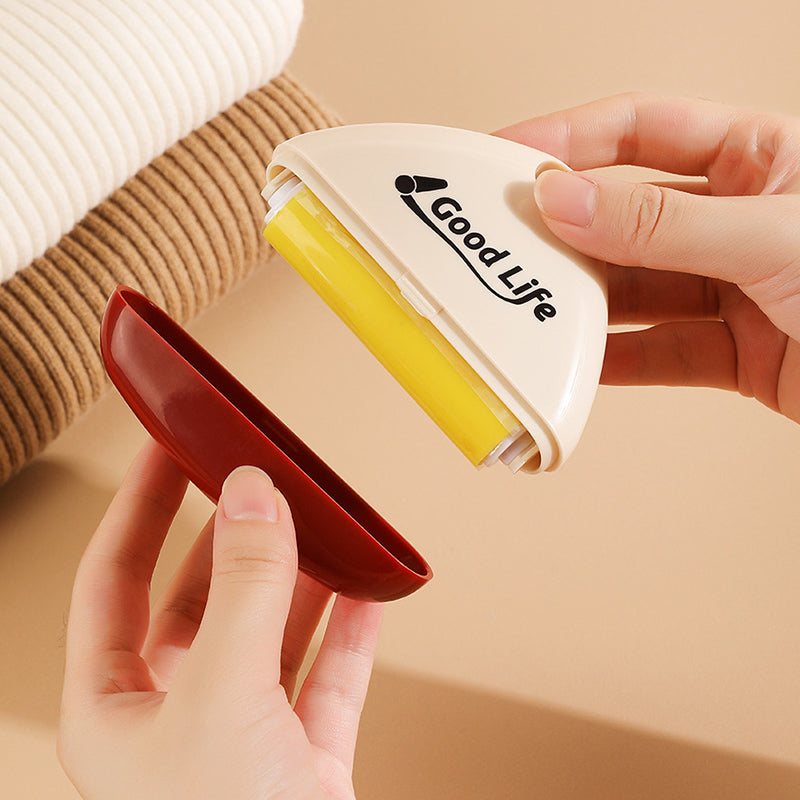 "Portabel tvättbar luddroller för hushållsbruk, vit+röd, elegant design, tar bort damm och djurhår enkelt."