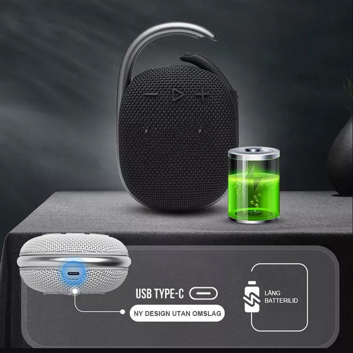 "Portabel vattentålig Bluetooth-högtalare i modern stil, robust och kompakt design för utomhusbruk"