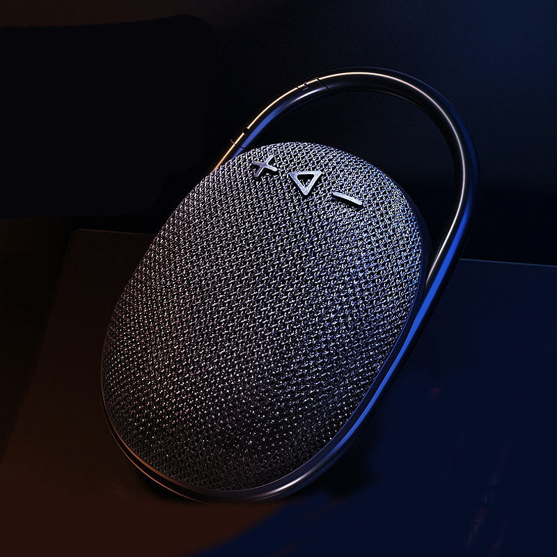 "Portabel vattentålig Bluetooth-högtalare i modern stil, robust och kompakt design för utomhusbruk"