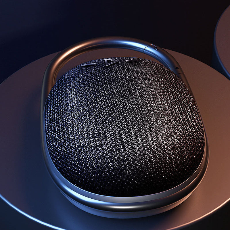 "Portabel vattentålig Bluetooth-högtalare i modern stil, robust och kompakt design för utomhusbruk"