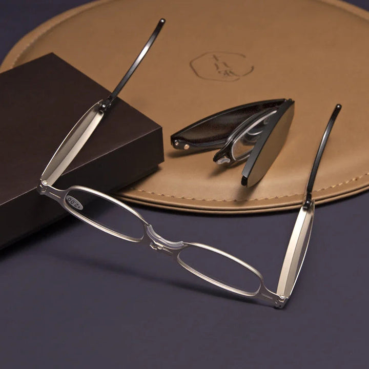 "Portabla mini läsglasögon: vikbara, eleganta i svart och silver, för män och kvinnor, stil och funktionalitet"