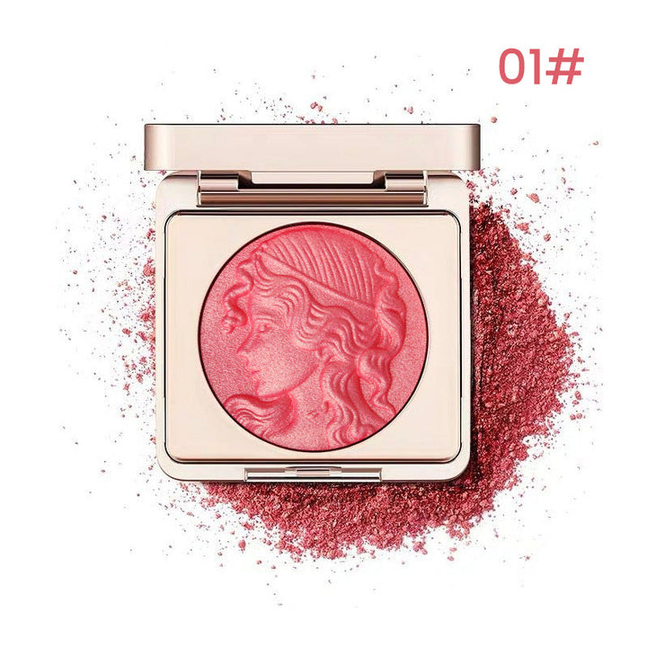 "Präglad puderrougepalett med naturlig glöd, elegant design, subtil skimmer och nyanser rosa till apelsin för alla hudtoner."