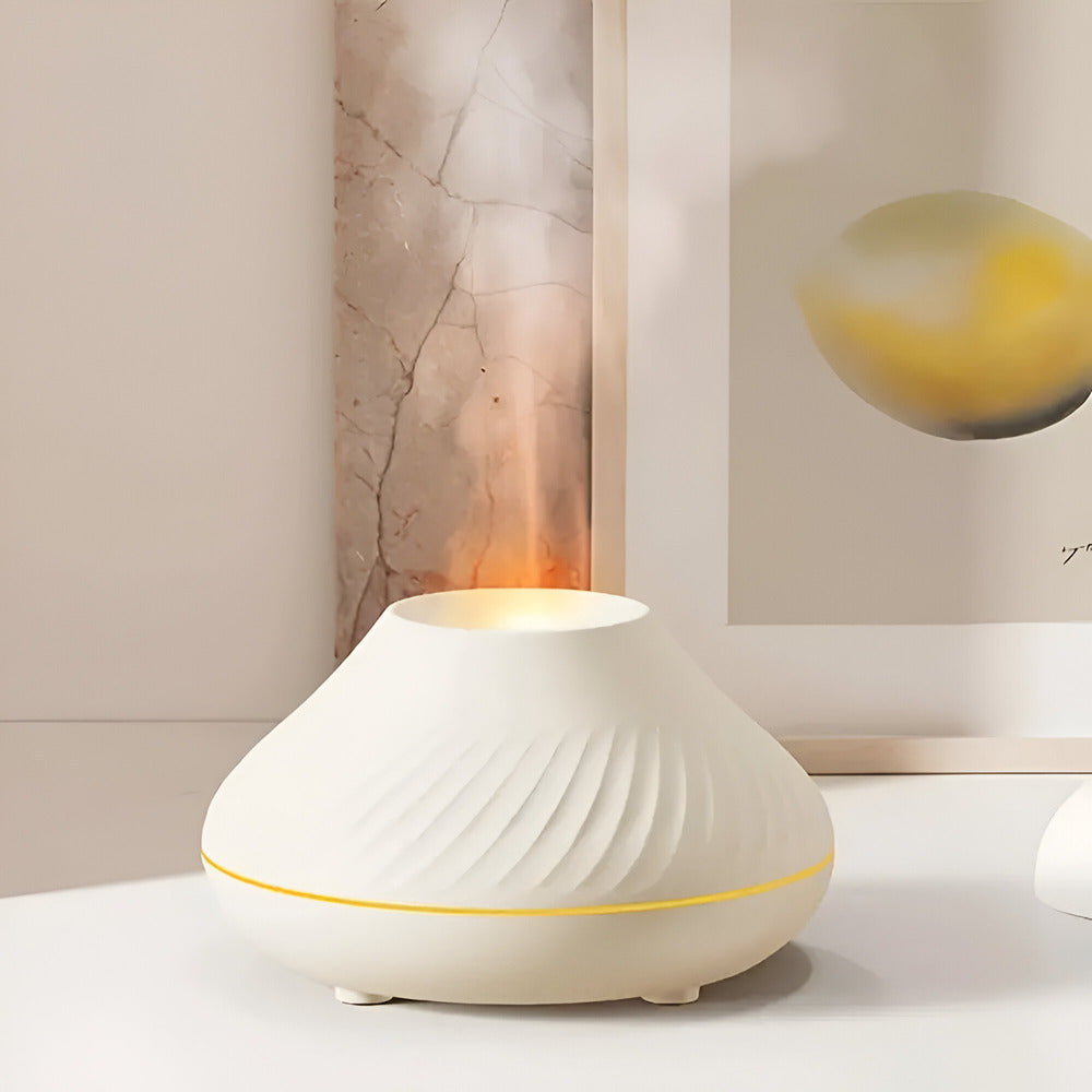 Modern luftfuktare med aromaterapi och LED för avkoppling. Tyst drift via USB-C, bra för välbefinnandet.