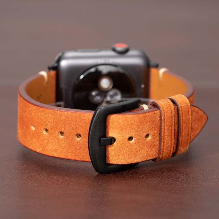 Stilrent unisex läderarmband för Apple Watch, elegant design för vardag och fest.