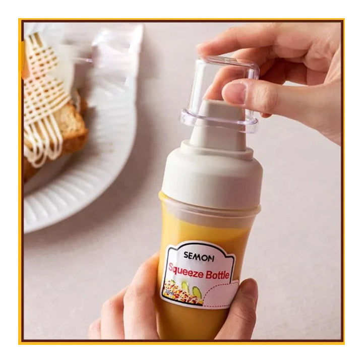 "Pressflaska för såser i köket, 350 ml, femhålsdesign, svart, vit och röd, jämn dosering, BPA-fri, matlagning."