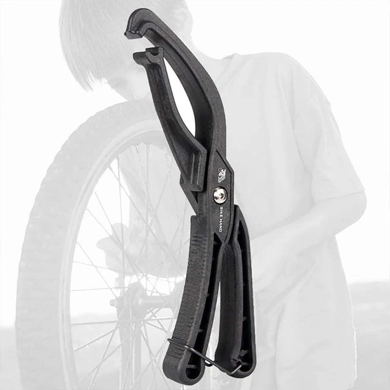 "Professionell däckklämma i svart nylon för enkel montering av däckpärlor utan skador på fälgar eller innerslangar."