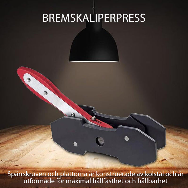 "Professionellt bromsok pressverktyg med rött stort handtag och blått litet handtag för effektiv bromsunderhåll."