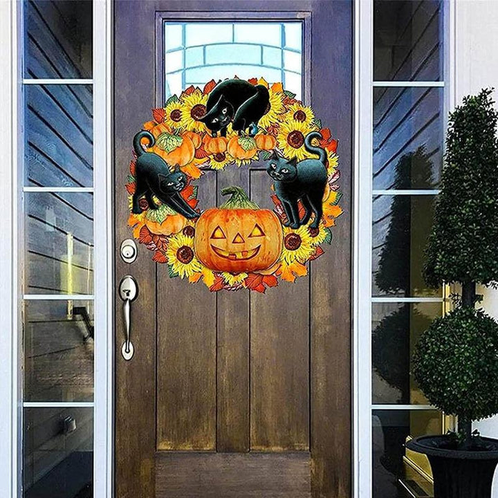 "Pumpa och kattmotiv Halloween-dekoration i plywood, perfekt för festlig stämning inomhus eller på ytterdörren."