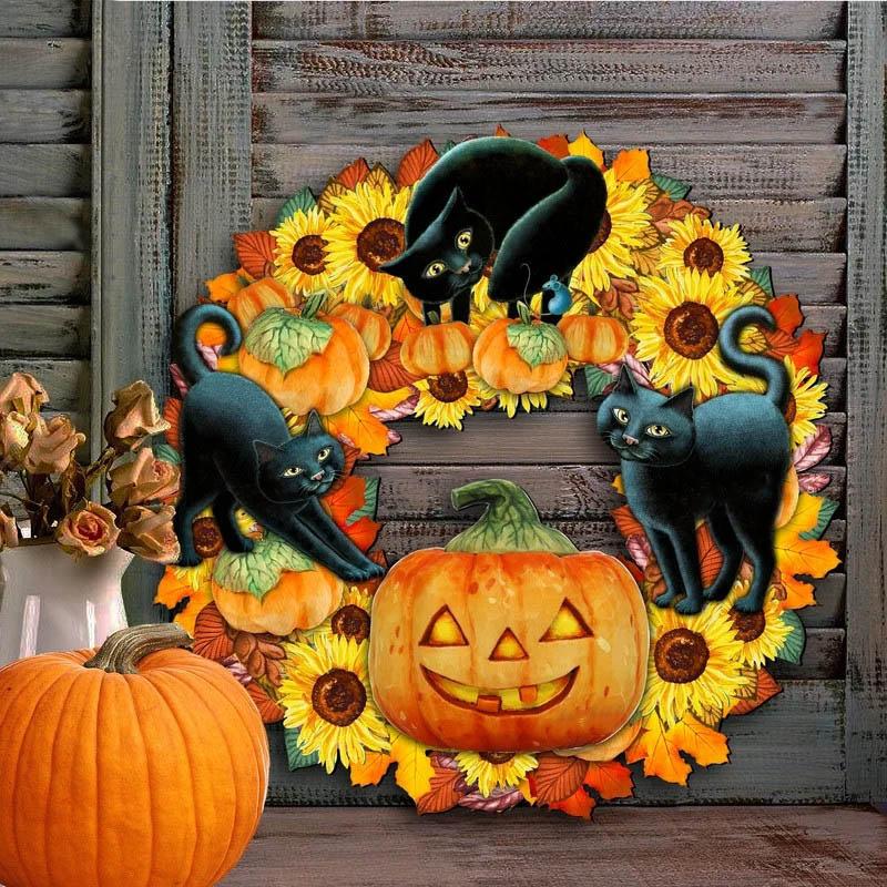 "Pumpa och kattmotiv Halloween-dekoration i plywood, perfekt för festlig stämning inomhus eller på ytterdörren."