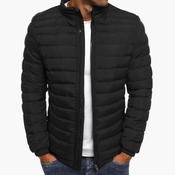 Quiltad herrjacka med stilren design, perfekta ytterkläder för casual mode. Utrustad med praktiska fickor.