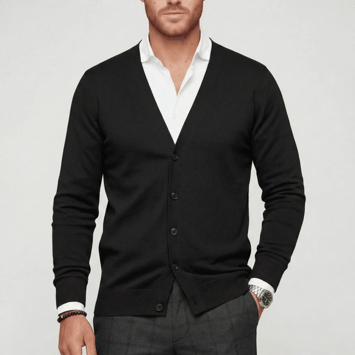 Detaljbild på V-ringad slim fit herrkofta i grön färg. Elegant och mjukt material.