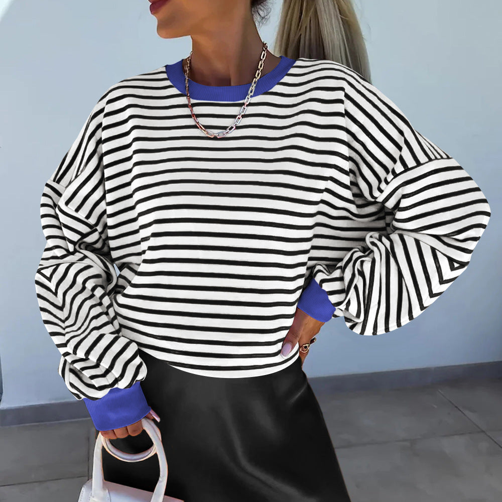 Mjuk långärmad damtröja, oversized och randig, för en modern och avslappnad look