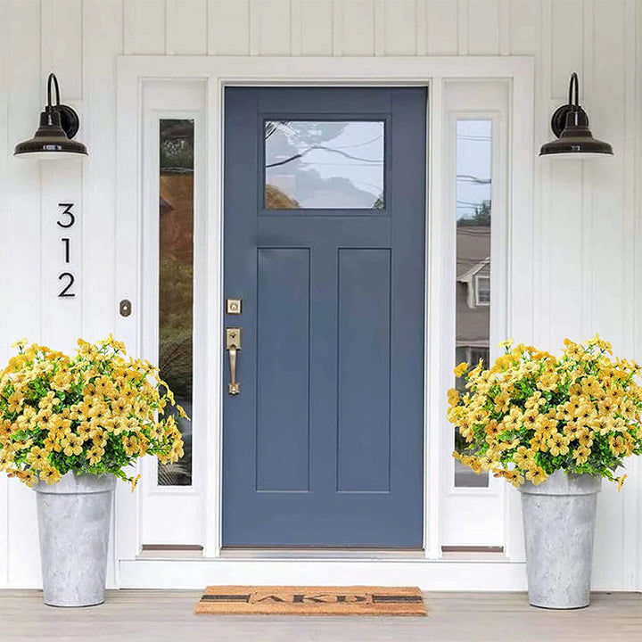 "Realistiska konstgjorda påskliljor för utomhusbruk, hållbara och väderbeständiga med gröna stjälkar, 35 cm höga."