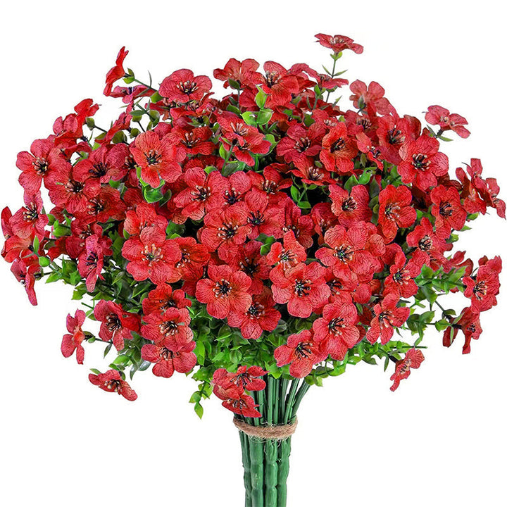 "Realistiska konstgjorda påskliljor för utomhusbruk, hållbara och väderbeständiga med gröna stjälkar, 35 cm höga."