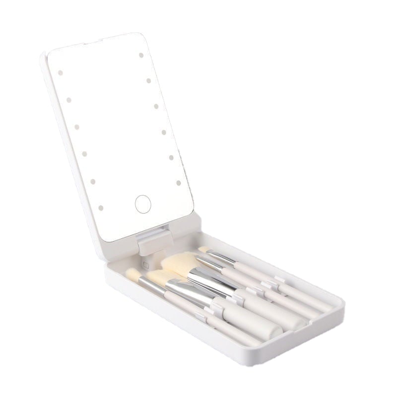 "Resesminkborstar med LED-spegel, kompakt svart väska, syntetiska borst, enkel applikation för perfekt look."