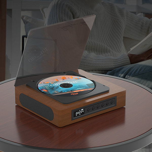 Elegant retro CD-spelare i vintage stil med modern Bluetooth-funktion för trådlös musikuppspelning.