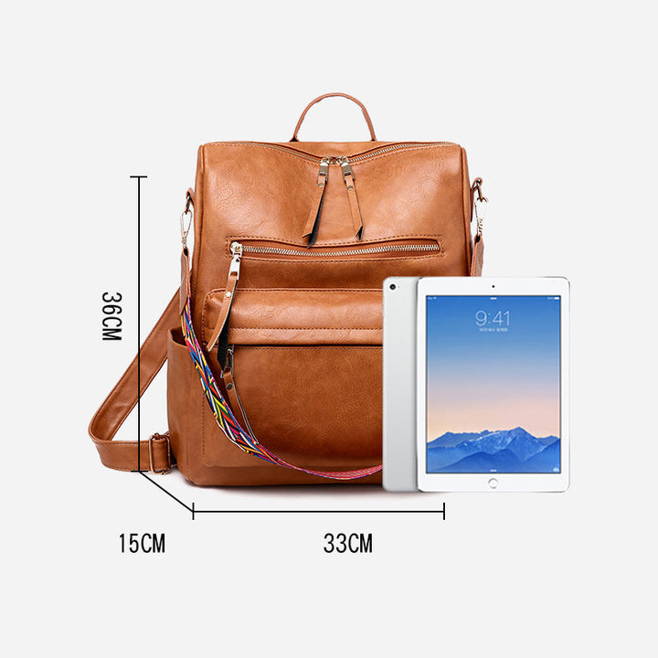 "Retro ryggsäck för kvinnor i PU-material, kvadratisk design, finns i svart, brun, rosa och grå, framifrån"