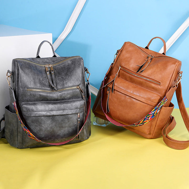"Retro ryggsäck för kvinnor i PU-material, kvadratisk design, finns i svart, brun, rosa och grå, framifrån"