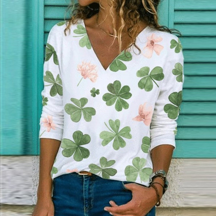 "Retro v-ringad blommig långärmad t-shirt för damer, elegant mönster och stilfull design i flera färgrika nyanser."