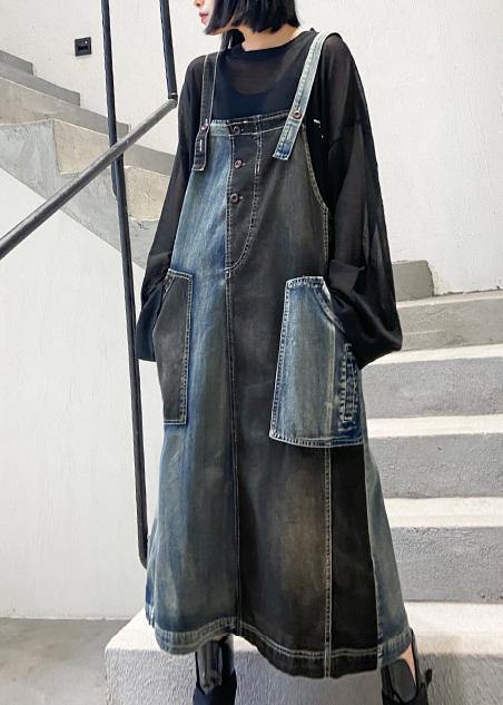 Ärmlös grå maxiklänning för kvinnor med asymmetrisk halslinje och fickor, elegant och funktionell design.