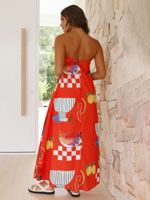 Ärmlös tropisk maxi klänning för kvinnor, flödande design, färgglatt mönster, perfekt för sommar och strandutflykter.