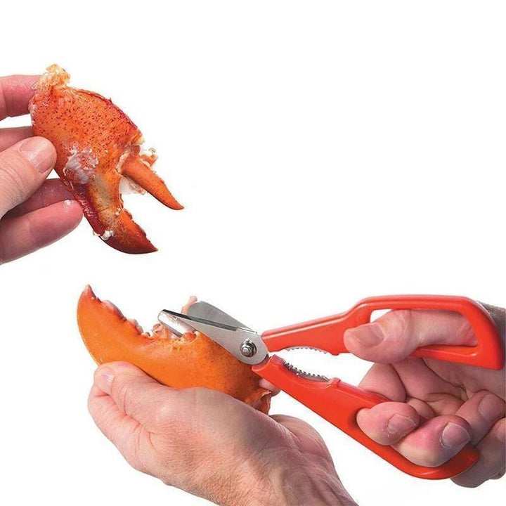 "Röd och svart skaldjurssax i rostfritt stål för effektiv och stilren krabbskärning, 7 tum lång, med ergonomiskt grepp."