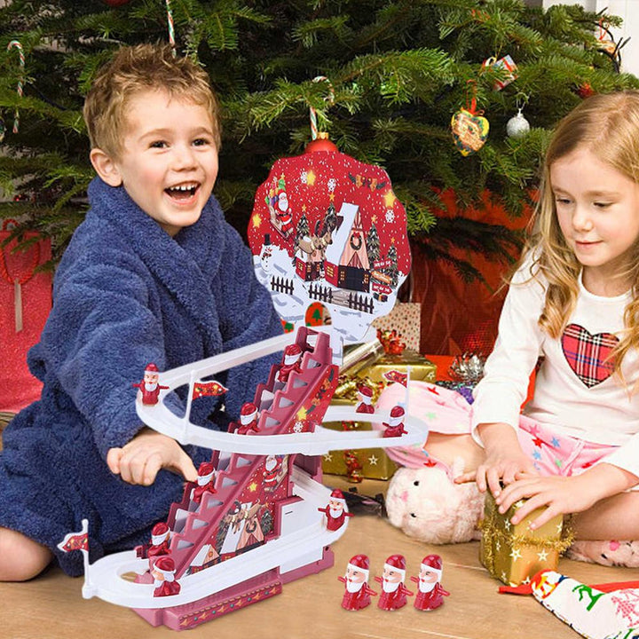 "Röd och vit elektrisk jultomterutschbana, leksak med LED-ljus och musik, skapar magisk julstämning för barn."