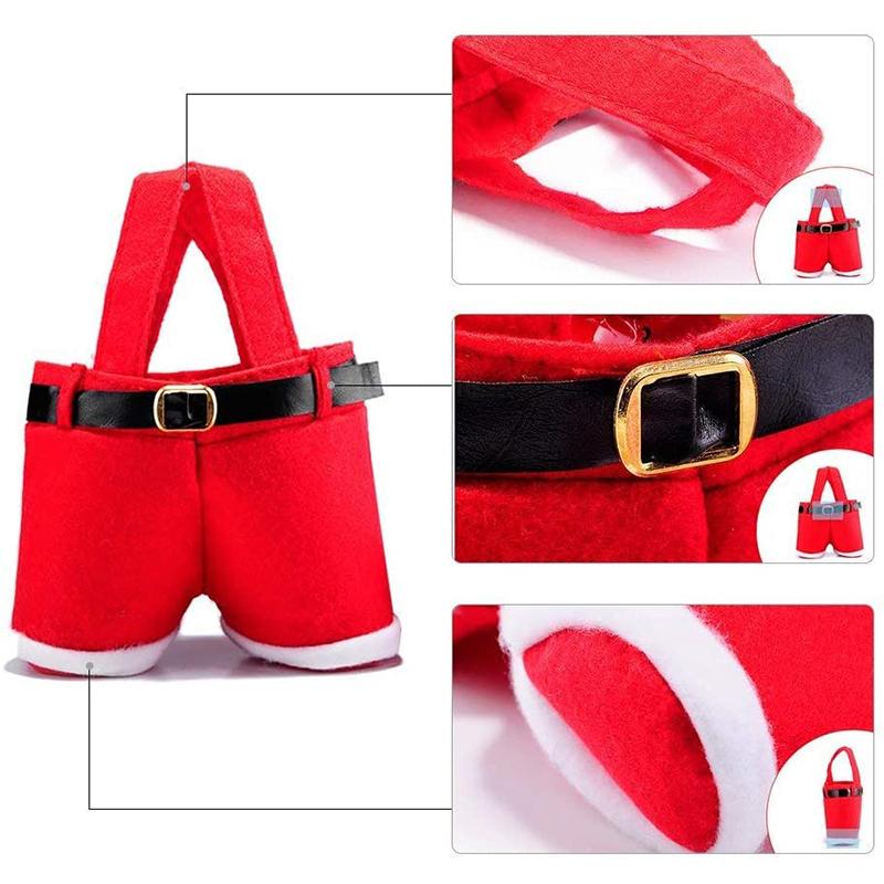 "Röd tomteluva presentpåse i klassisk stil med vit kant, idealisk för julgåvor och dekorativ användning."