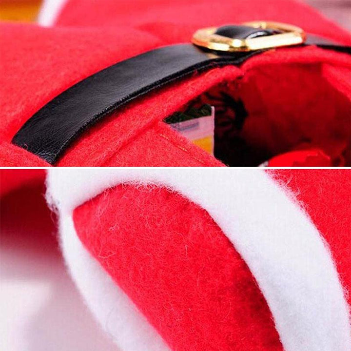 "Röd tomteluva presentpåse i klassisk stil med vit kant, idealisk för julgåvor och dekorativ användning."