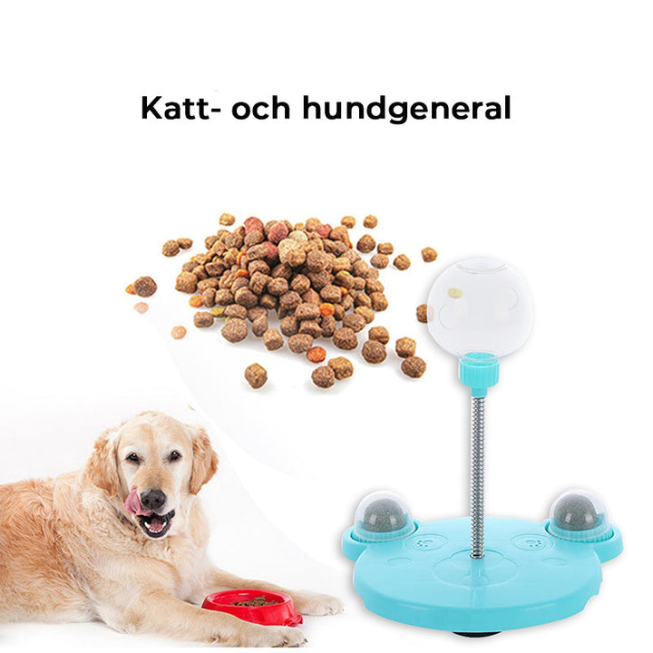 "Rosa och blå interaktiv automatisk bollmatare för husdjur, med bollar och sugkoppar för stabilitet och lekglädje."